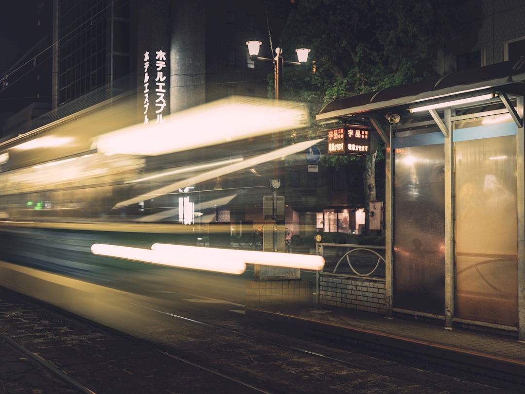 a blurry photo of a train at night